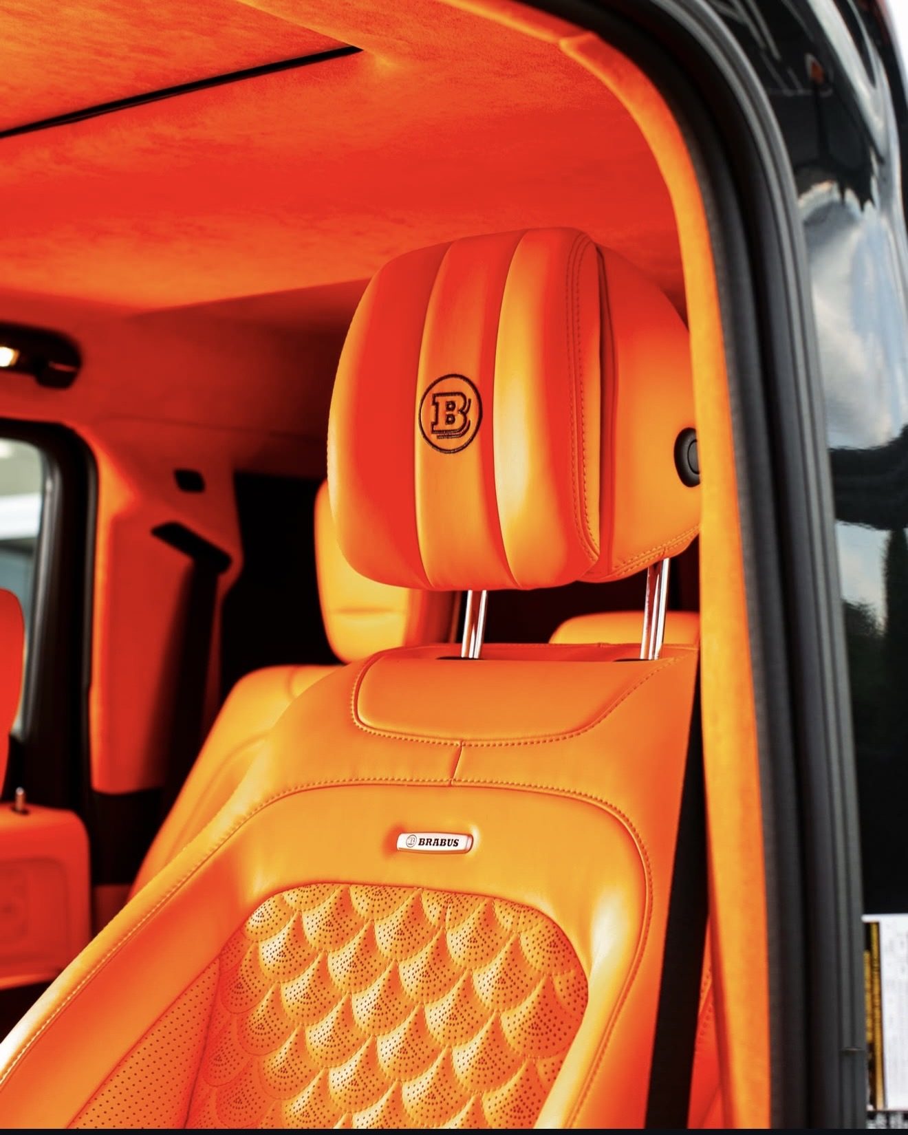 Custom orange quilted leather Brabus interior retrimmed by Restyle Miami